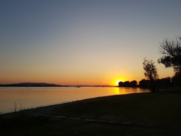 Sonnenuntergang am klostereigenen Badestrand